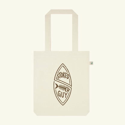 Beige tote bag with 'Stoked Guy' logo on a beige background