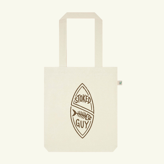 Beige tote bag with 'Stoked Guy' logo on a beige background
