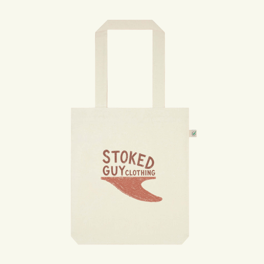 Beige tote bag with 'Stoked Guy Clothing' text and logo on a white background