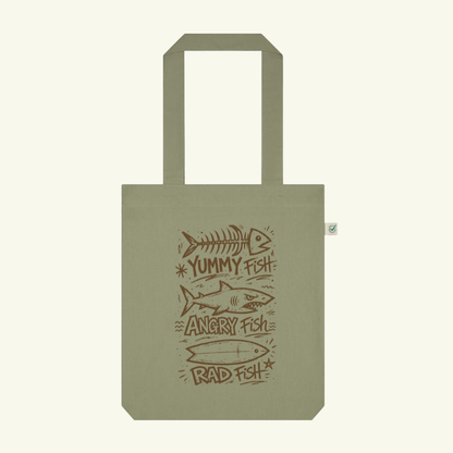 Green tote bag with fish illustrations and text on a white background