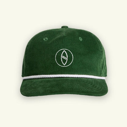 Green cap with a white logo on a light gray background